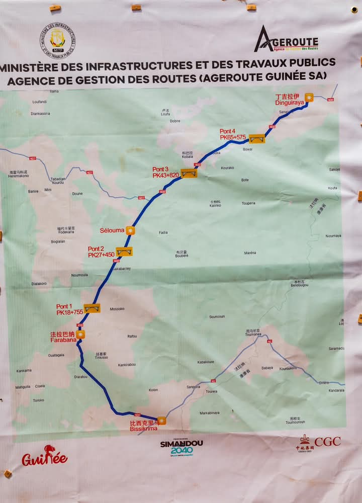 Infrastructures,Réhabilitation routière,Bitumage,Dinguiraye,Bissikirima,Dabola,Travaux publics,Budget National de Développement (BND),CGC,Amadou Oury Bah,Mamadi Doumbouya,Désenclavement,Transport routier,Développement rural,Gouvernement guinéen,Projet d'infrastructure,Souffrance des usagers,Délai des travaux,Président de la République,Investissement public